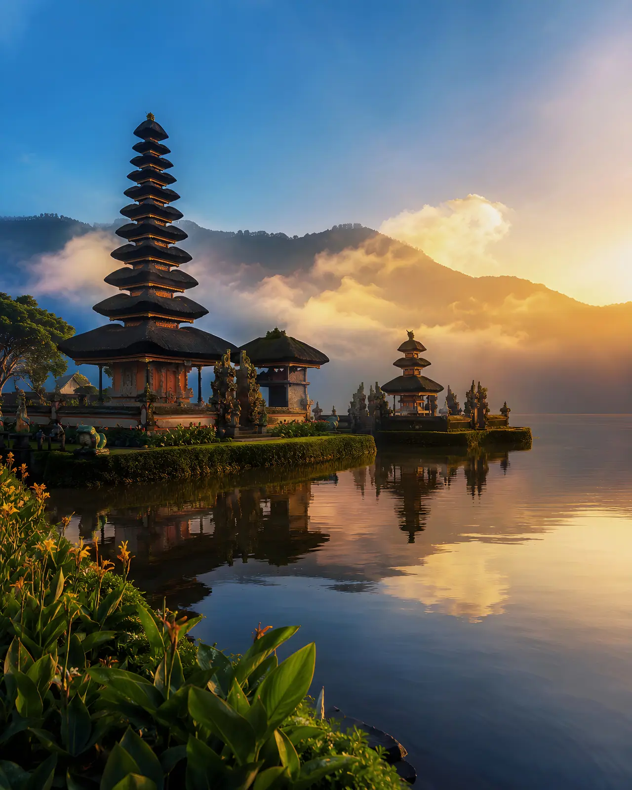 A tiered Balinese temple on the edge of Lake Bratan at sunrise